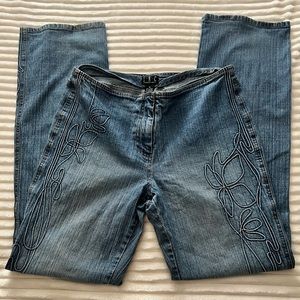 I.N.C mid rise light mid wash embroidered (?) floral pattern denim
